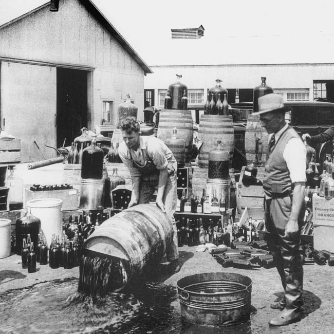 Prohibition United States - Orange County Sheriff's deputies dumping illegal booze Santa_Ana 3-31-1932